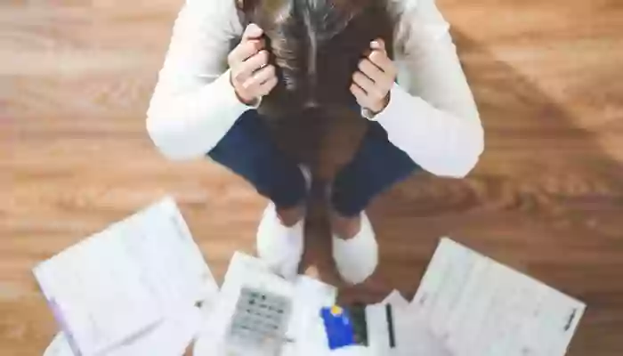 Why should you avoid being tied to bank debts?